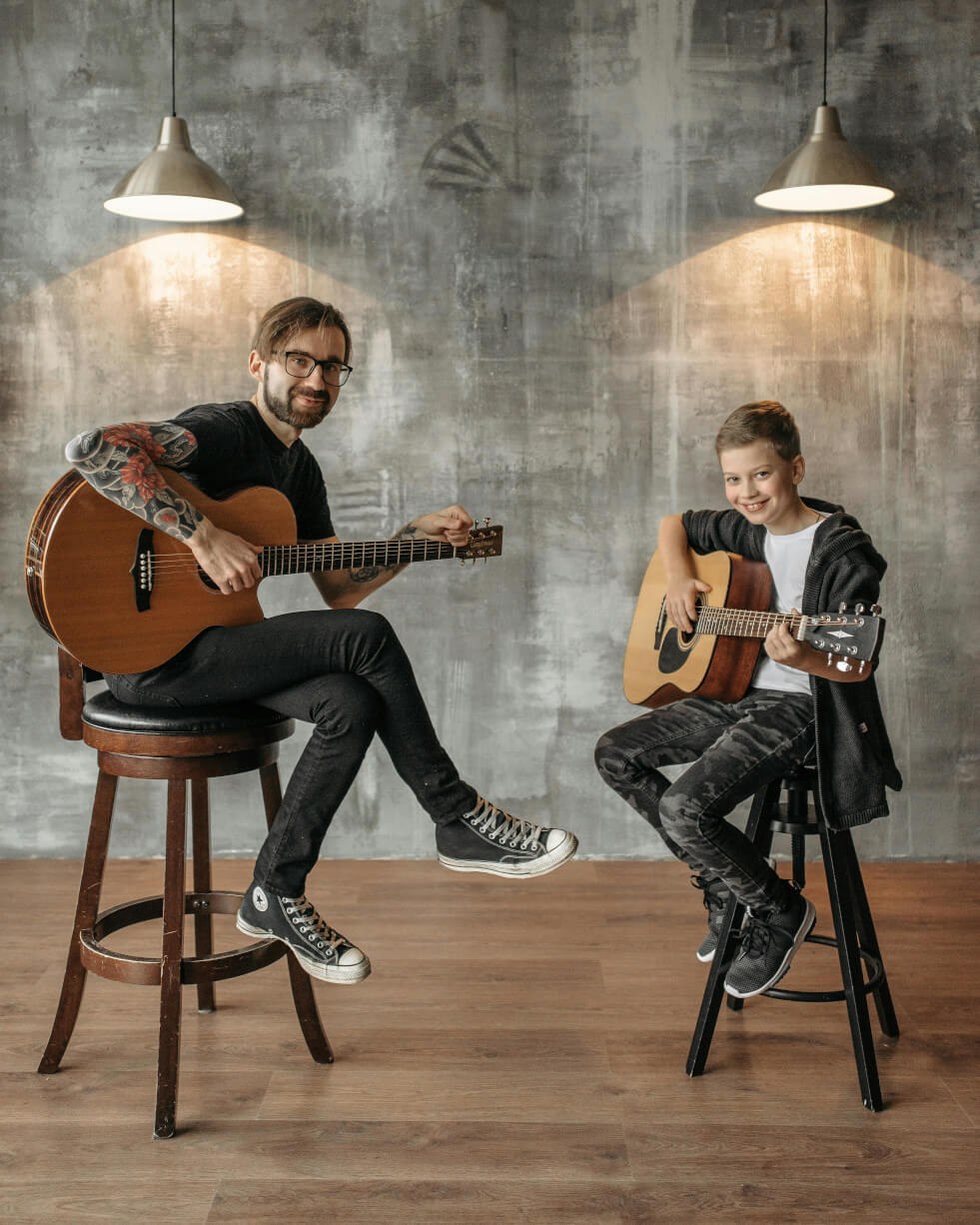 photo of a music student with a teacher